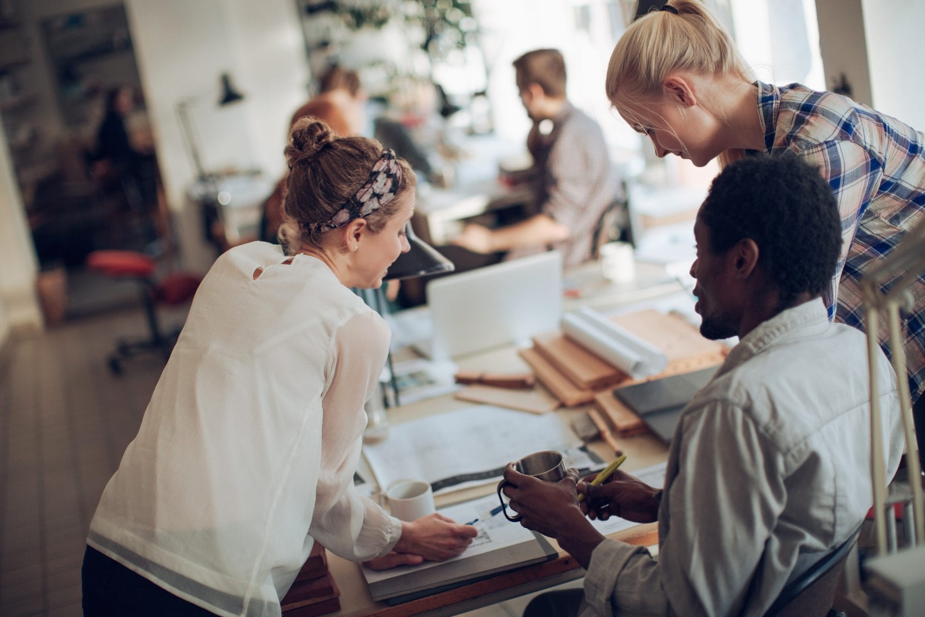 Sweden work permit help specialist reviewing application documents